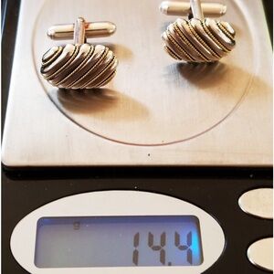 Tiffany &Co Sterling 925 &18 K gold twist rope cuff links.